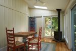 Sun room off great room with card table